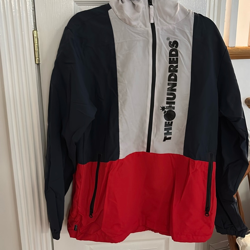Men’s size small hooded anorak from the brand “the hundreds”.